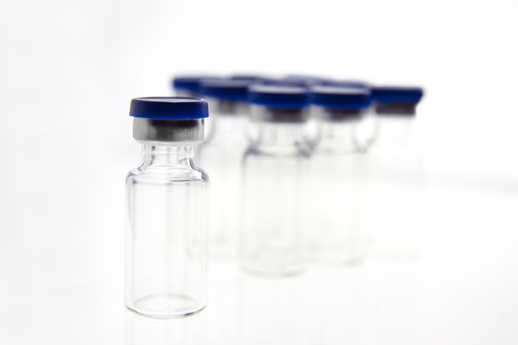 Addressing glass particulates in injectable drug formulations