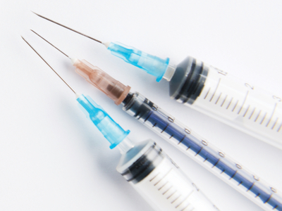 Needles can pose a risk to patients if harmful chemicals are extracted from the packaging during use. In the Netherlands, the fear of glue leaking from needles postponed the MMR vaccination of babies.