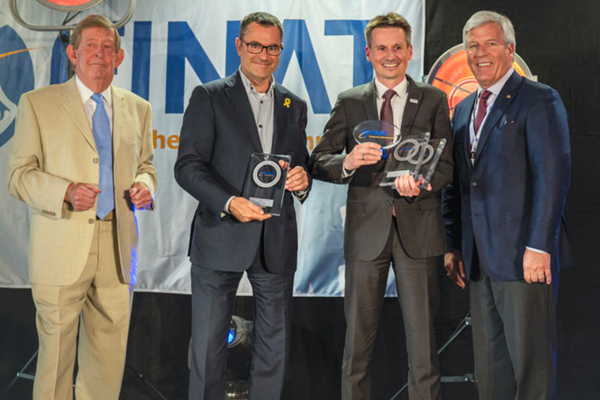 Jens Vor der Brueggen, Leader R+D at Schreiner Group (2nd from right), accepts the awards for the four products
