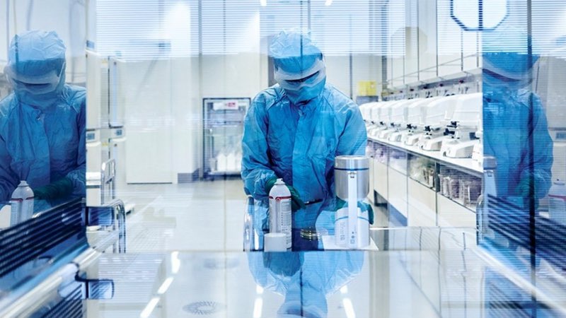 A cell processing specialist at work in new cell and gene facility in Stein. Photo as seen on Novartis website