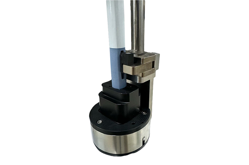 WLS device stabilizer for injector pens on rotary labelers