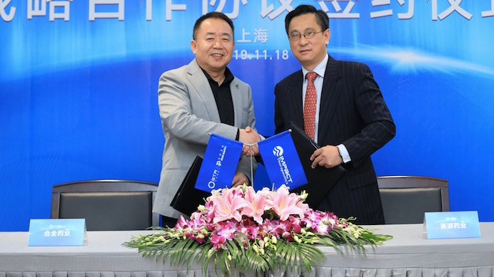 L-R: WuXi Sta CEO Minzhang Chen and Jun Bao, Impact CEO