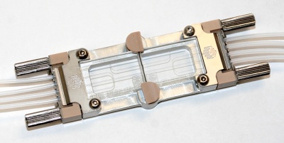 Chip holder allows direct coupling of microfluidic chips