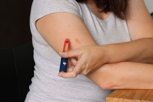 Empowering patients with self-administration drug delivery devices