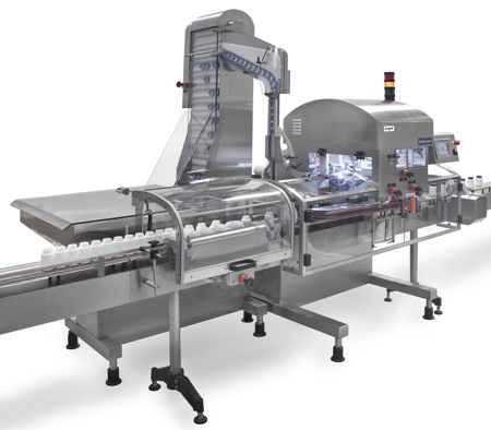 High-speed capping machine caps 300 bottles/min