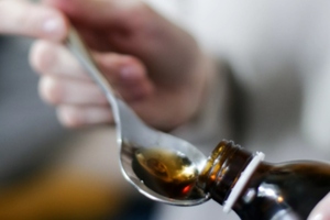 Increasing patient compliance with ion exchange excipient taste masking