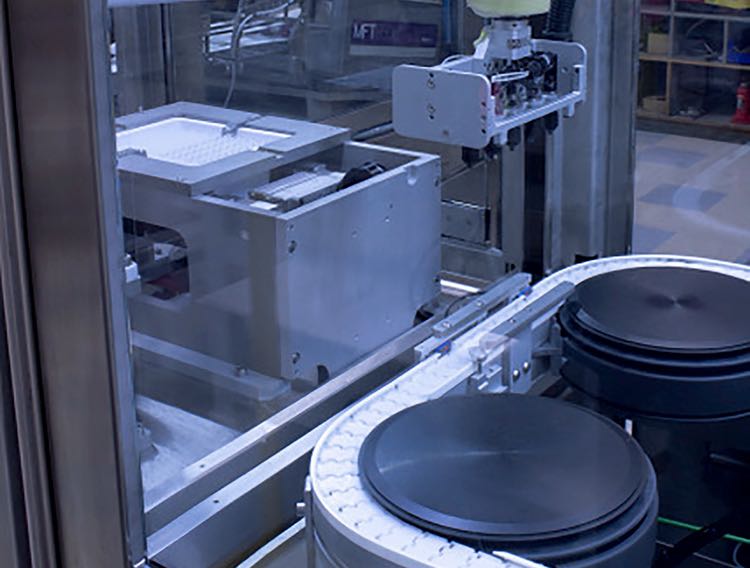 NuTec employs cleanroom robots to develop automated medical syringe manufacturing