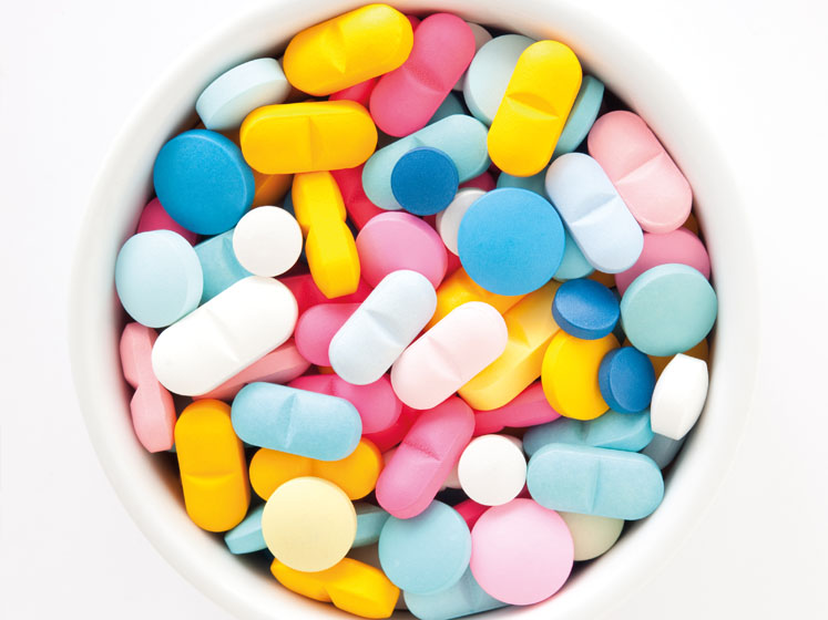 Optimising coating process parameters and formulation concepts for functional taste-masking during continuous manufacturing  